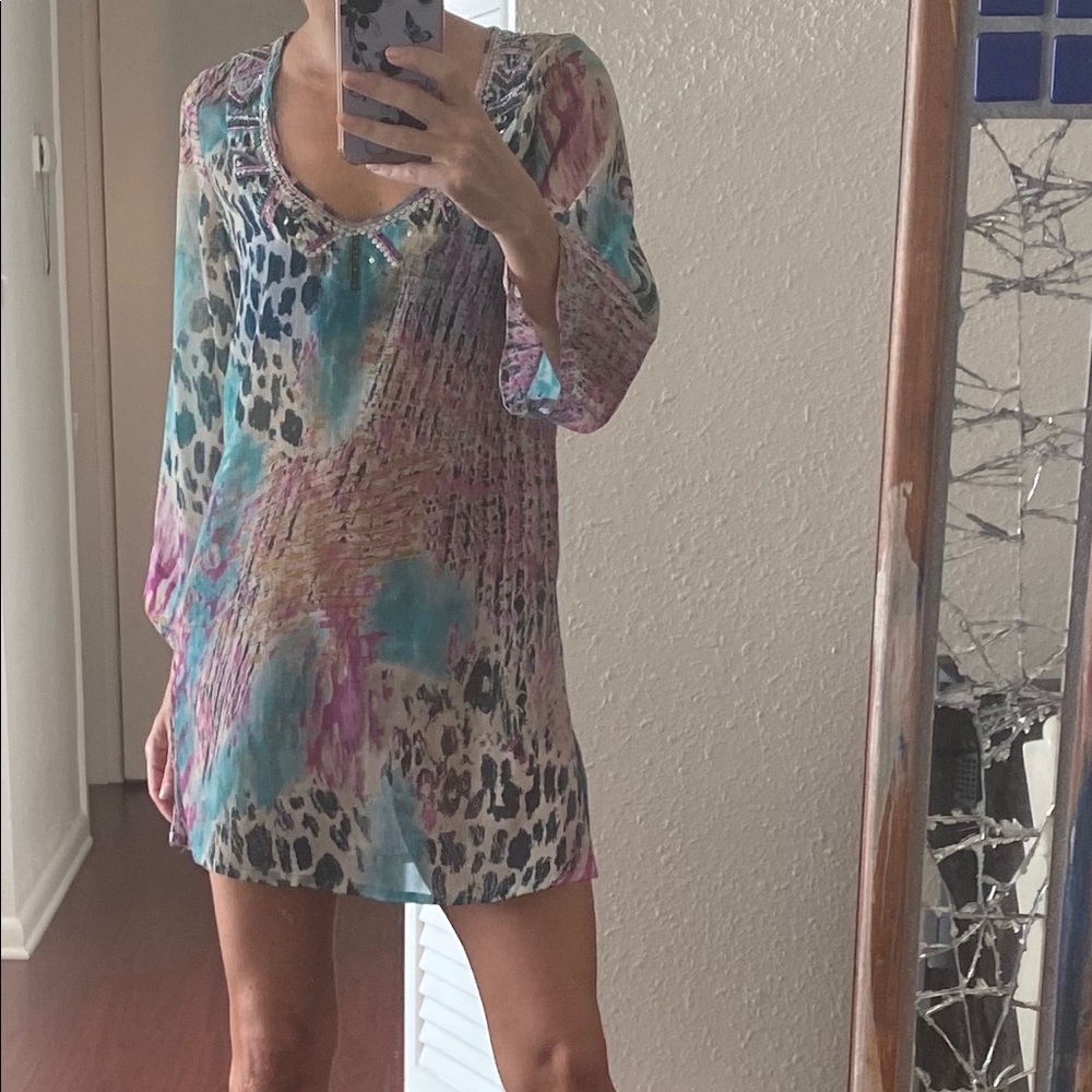 Lightweight cover up. Goes well with jeans too.